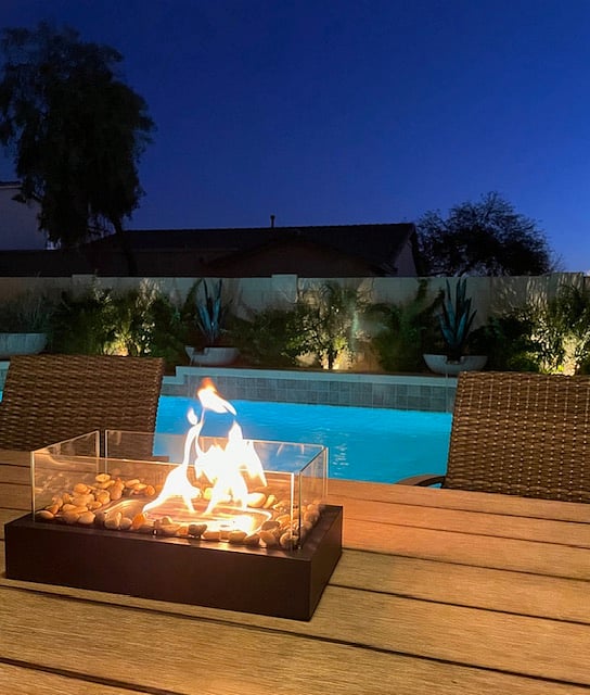 Relax and enjoy large covered patio, fire-table feature and backyard oasis.