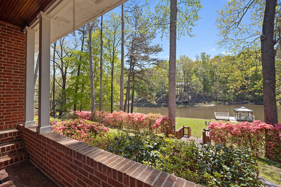 Back porch seating areas looking towards the lower yards and lake