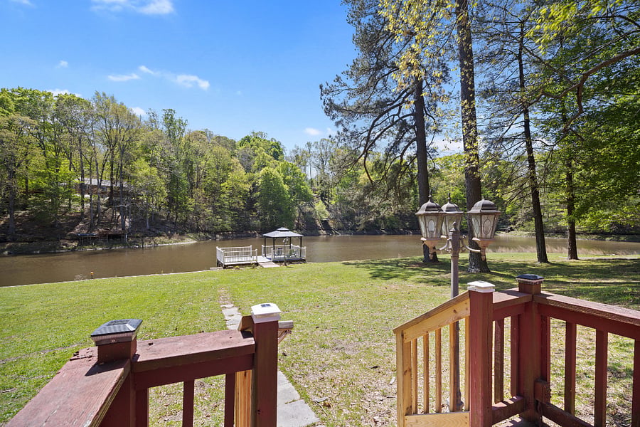 Looking down to the lower back yard and lake and Dock