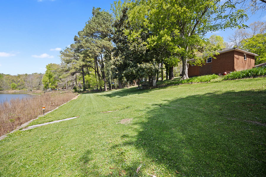 West side lower yard along lake edge
