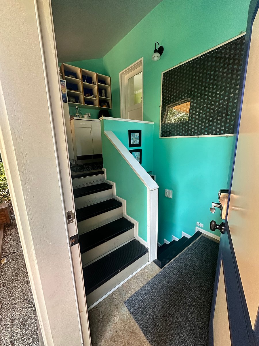 Back main entry with key code. Up to the main house, down to the basement, 5 steps with railing.
