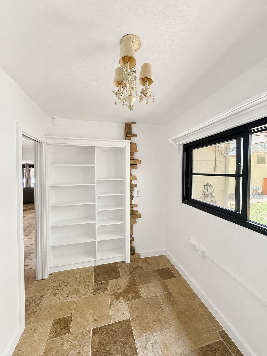 Bedroom 2 with built in shelves