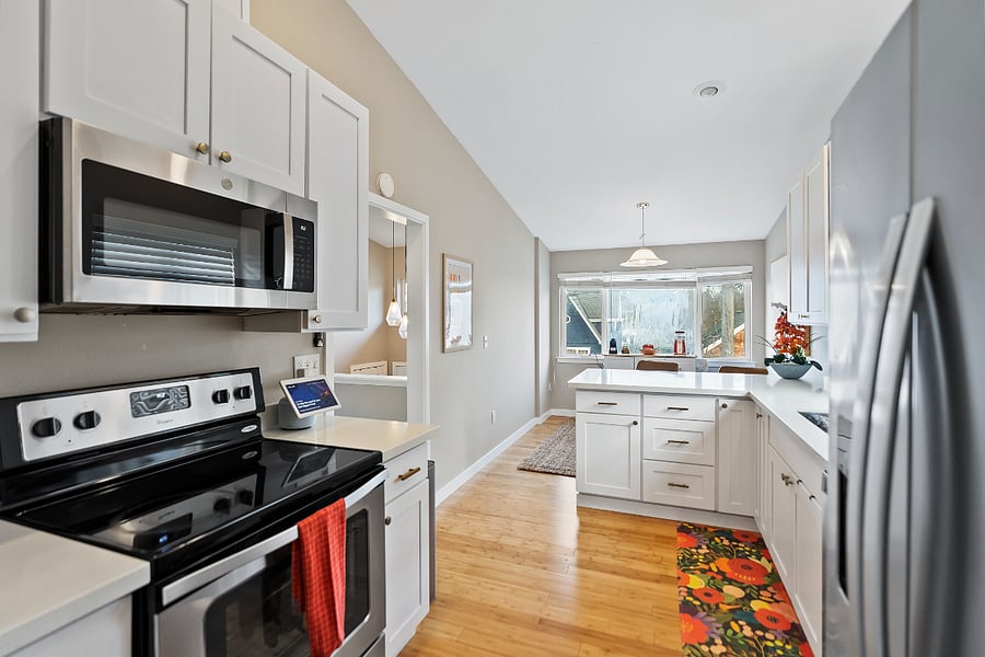 Fully stocked full-sized kitchen featuring a Breville air fryer/convection oven