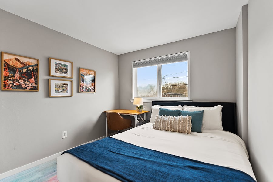 Third bedroom with queen bed and desk