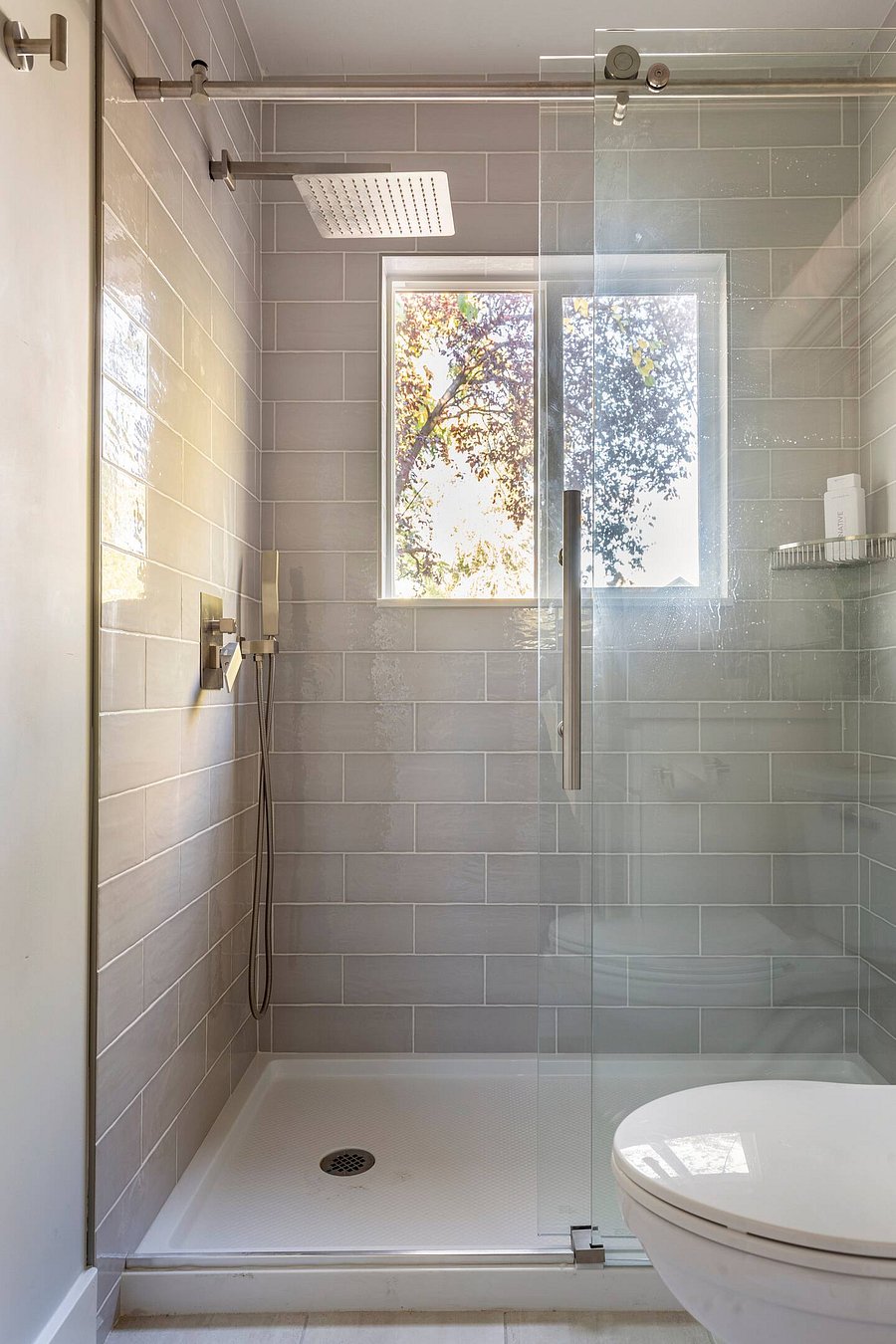 Privacy film has been added to the window since photos. Beautiful light comes through but cannot see in or out :)