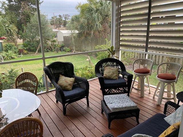 Screened-in porch on our large yard at the back of the house