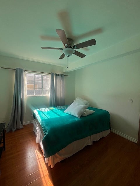 larger than average size bedroom with good sided closet