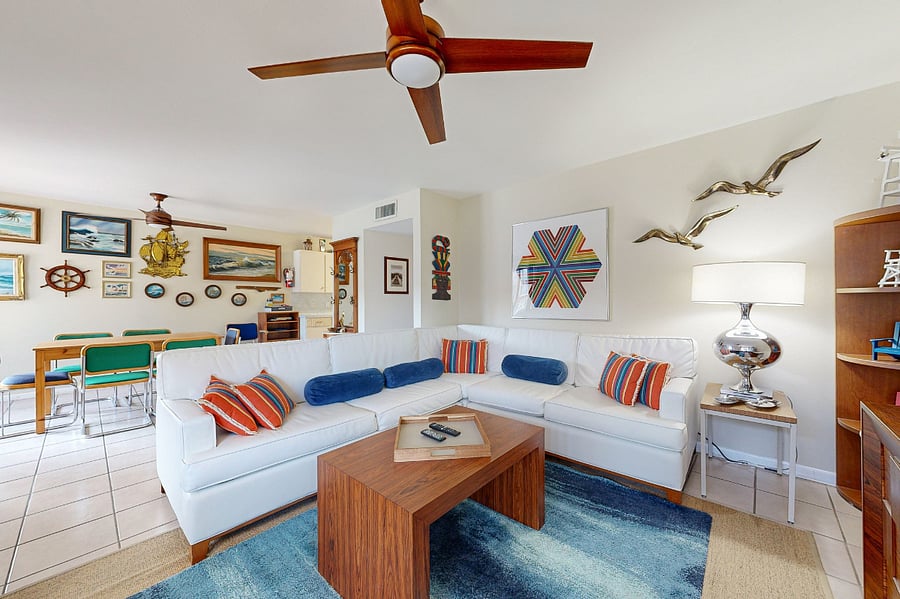 Picture windows illuminate the main living and dining space