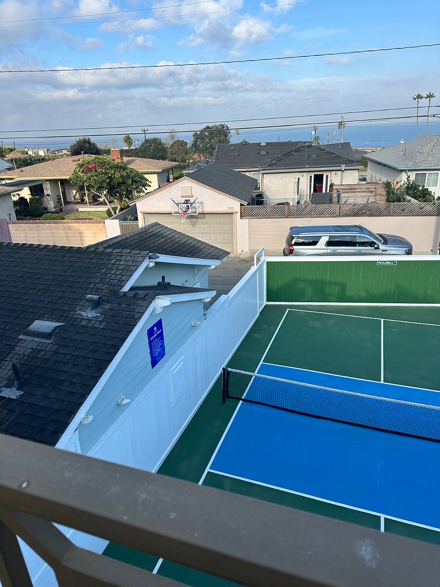 Pickleball court, bungalow on left.