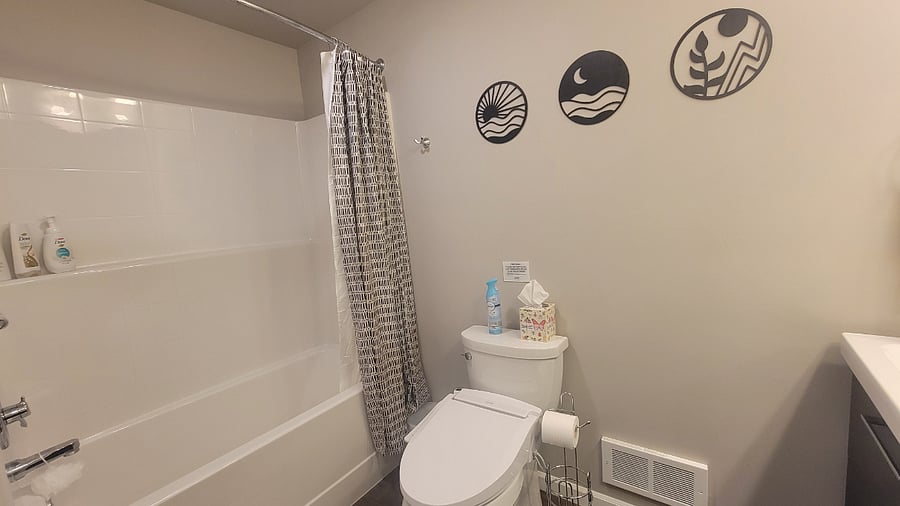 Bathroom with double sinks, heated toilet seat and bidet