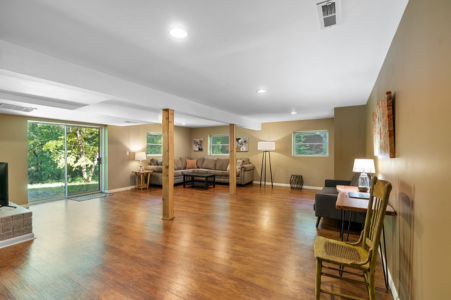Lower level QUEEN bedroom, with sofa, bathroom, LAUNDRY