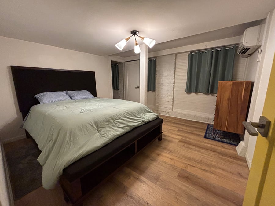 Primary bedroom with queen bed