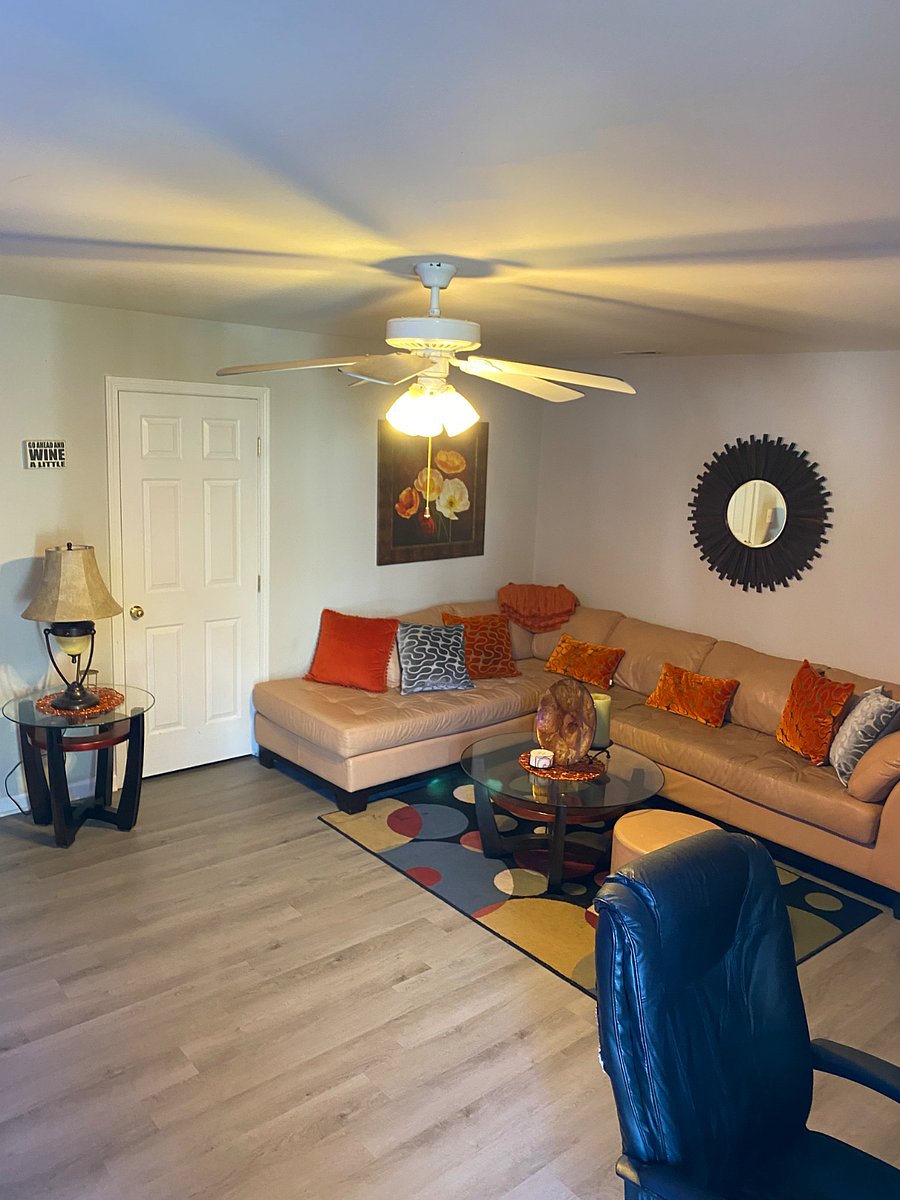 Media room with 65 smart Vizio TV, computer desk, Keurig and kitchenette