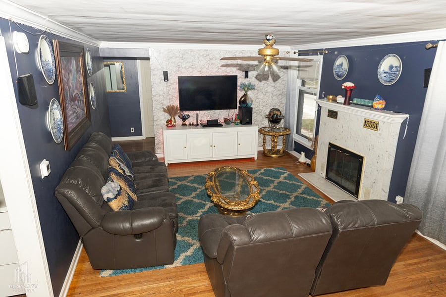 Common living room with Smart TV and surround Sony Home Theater sound system.