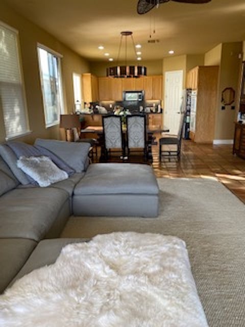 View of great room with living, dining and kitchen areas.
Laundry and extra 1/2 bath adjoins this space