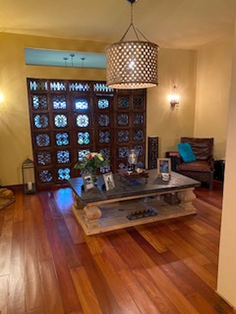 Entry into the central space of the home
Indonesian doors to separate "spa room"