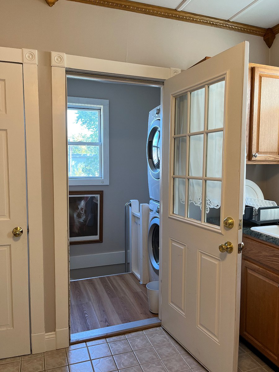 Shared washer/dryer off Kitchen