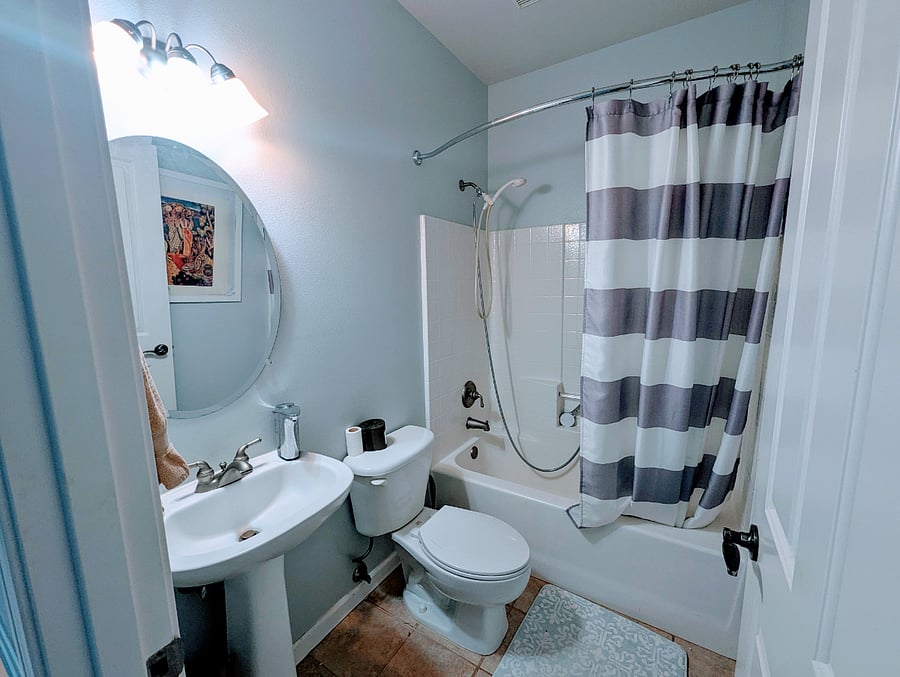 Semi-private bath.  4 bathroom house.. this bathroom will only be shared if there are elderly visiting who can not go upstairs.
