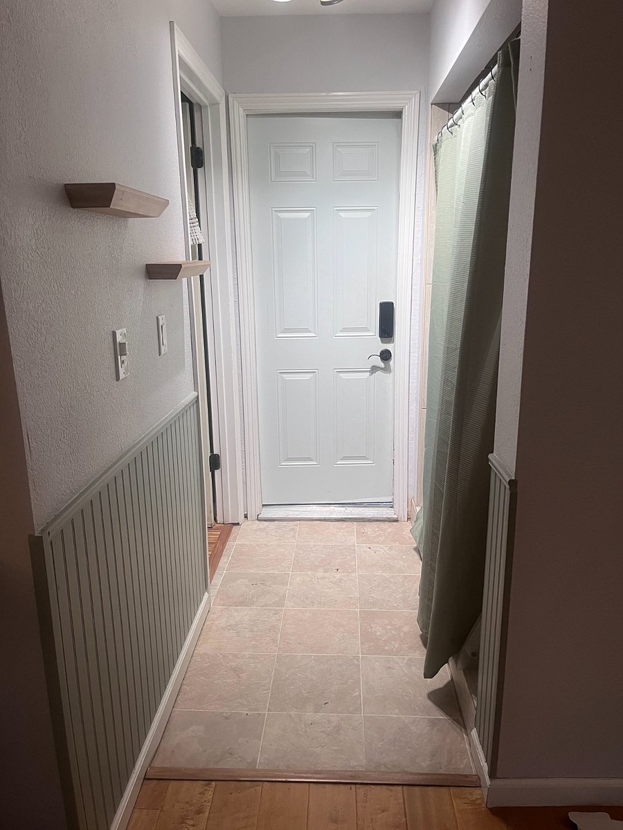 View of entryway which can be locked from inside and accessed with a passcode.