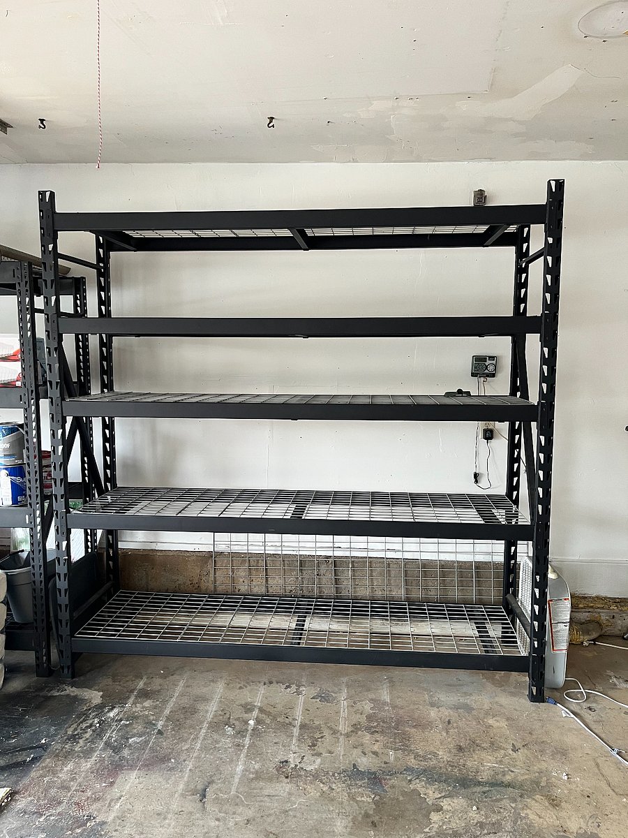 Garage storage racks available. 7ft tall, about 8ft wide. Fits a lot of stuff!