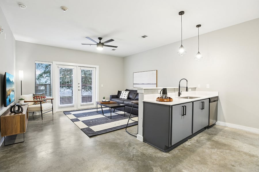 Living room and backdoor that goes to the large, private patio