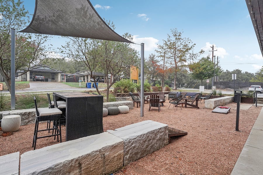 Outdoor community lounge area with games