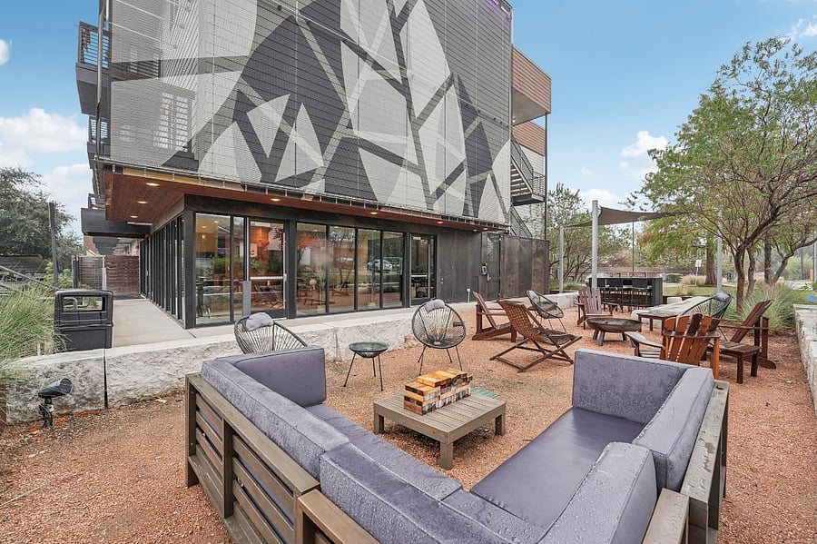 Outdoor community lounge area with games