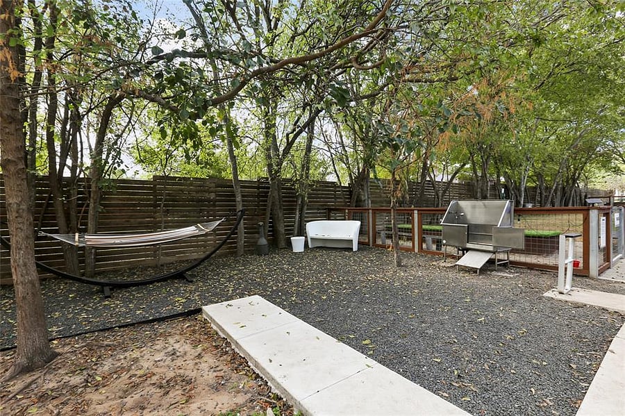 Outdoor community area with dog park and dog washing station