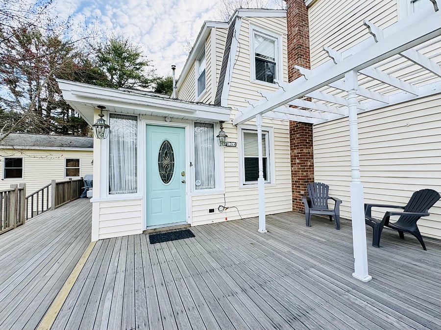 Front door with surround deck