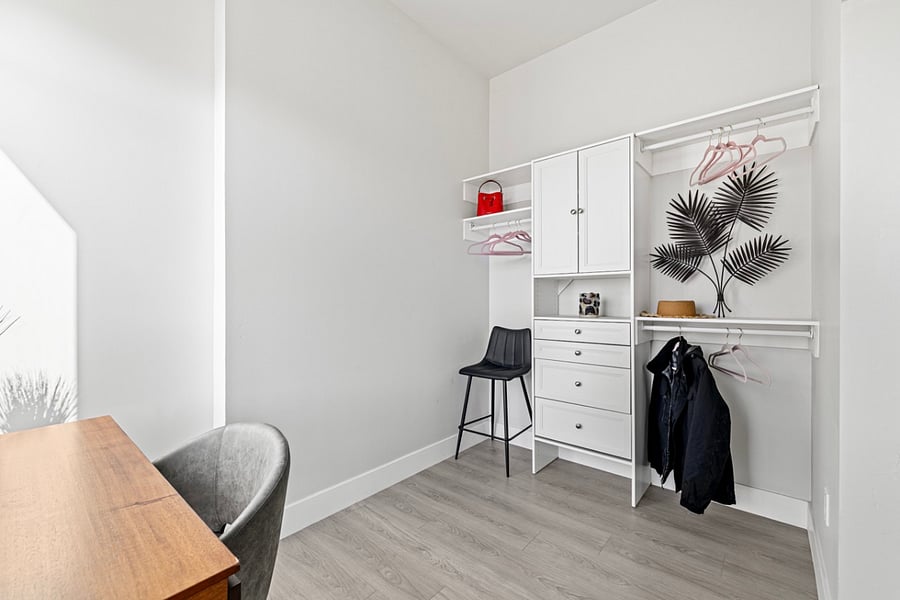 Step into luxury and organization with this full-size walk-in closet featuring beautifully organized cabinets. Your clothing and accessories deserve to be displayed in style!"