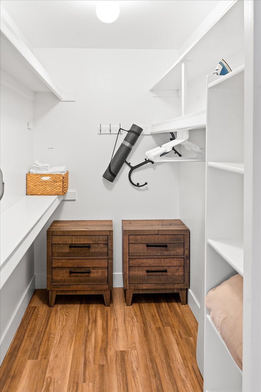 Walk in closet includes lots of storage as well as many amenities