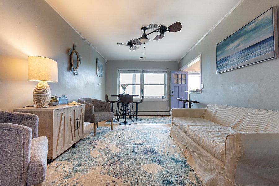 Living room with view of dining room.