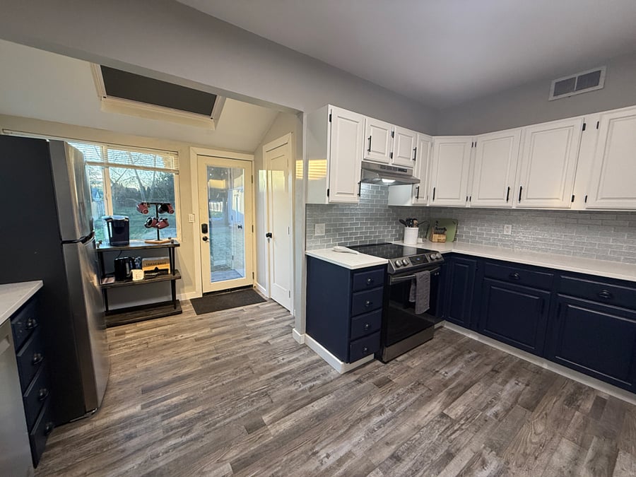 Kitchen with coffee bar and extra fidge