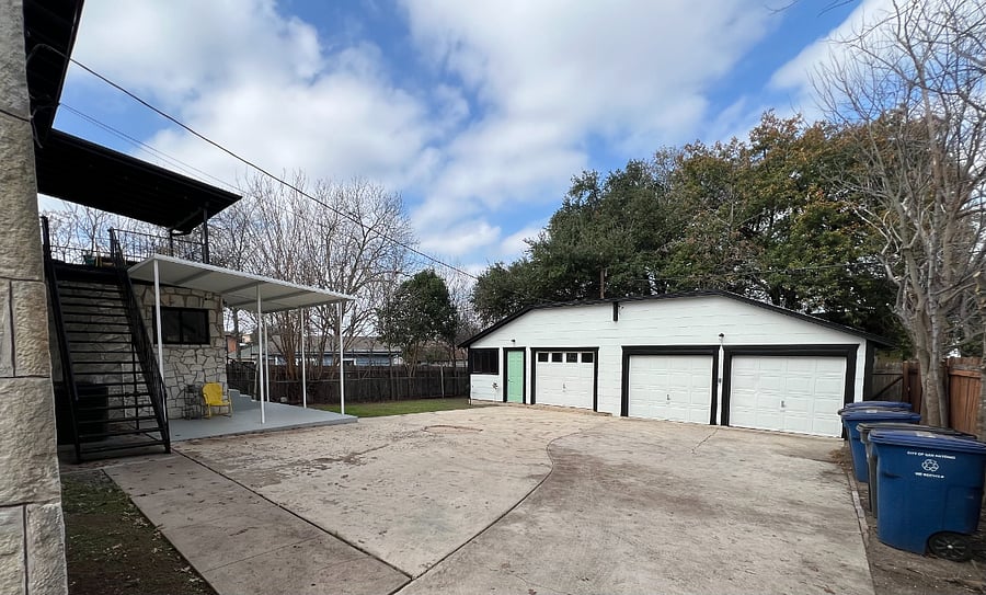 Dedicated garage space and parking pad 
