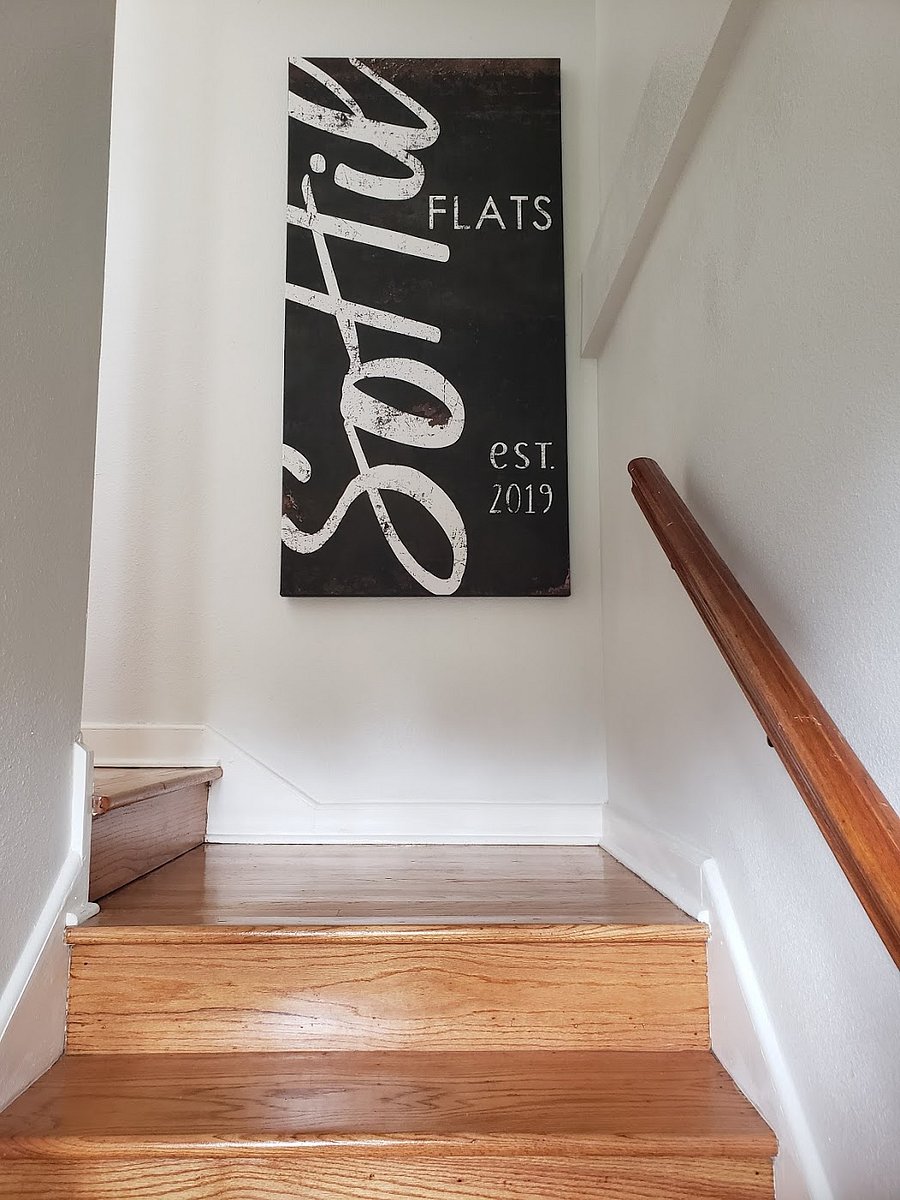 Staircase leading to main front entry 