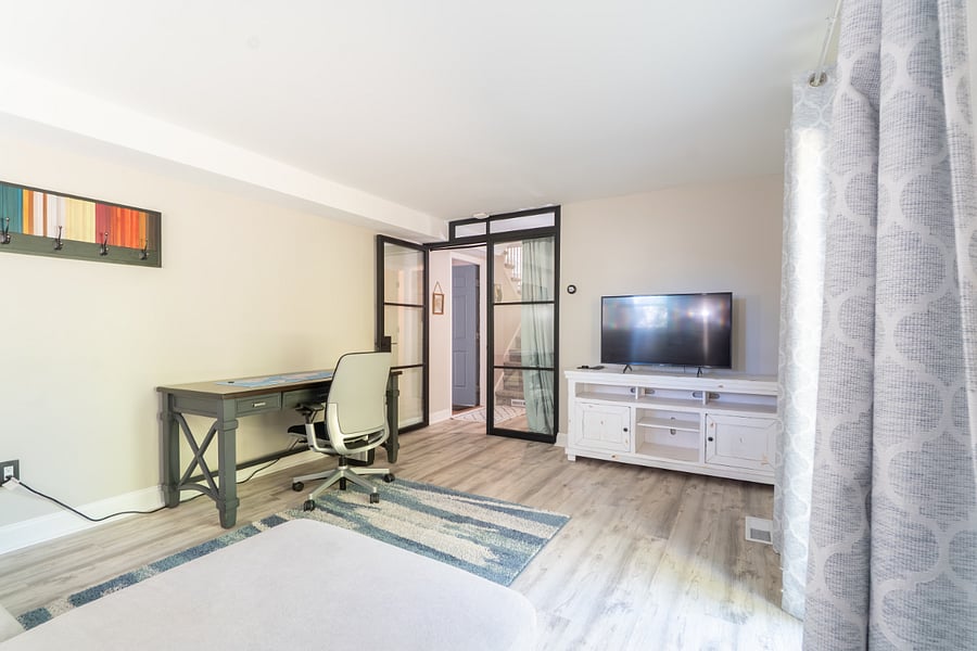 Family Room, with sound deadening glass enclosure