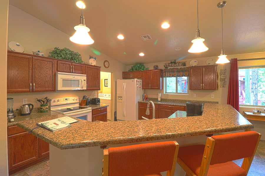 The bright and spacious kitchen is easy to work in.