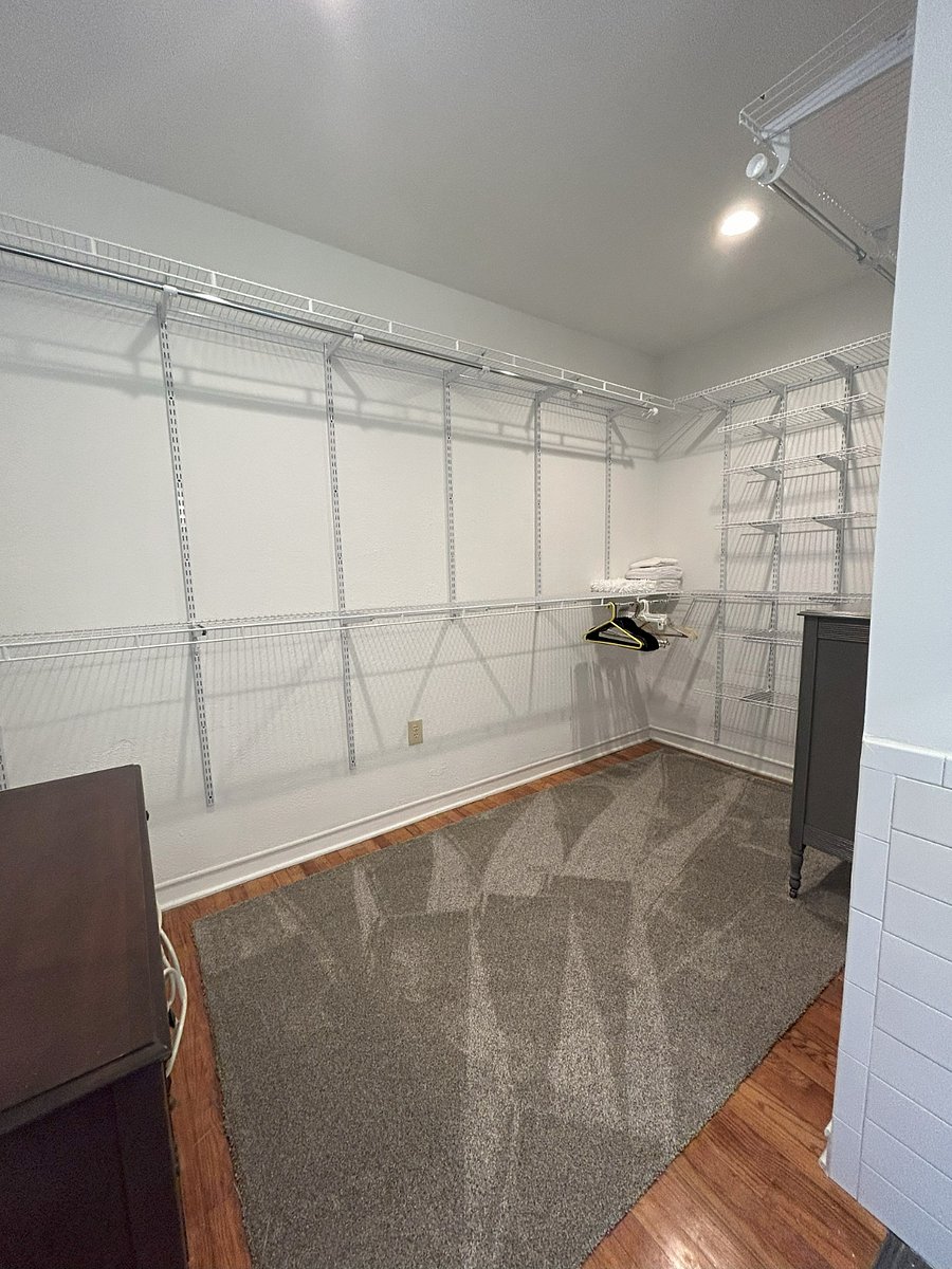 Huge walk in closet off main bedroom