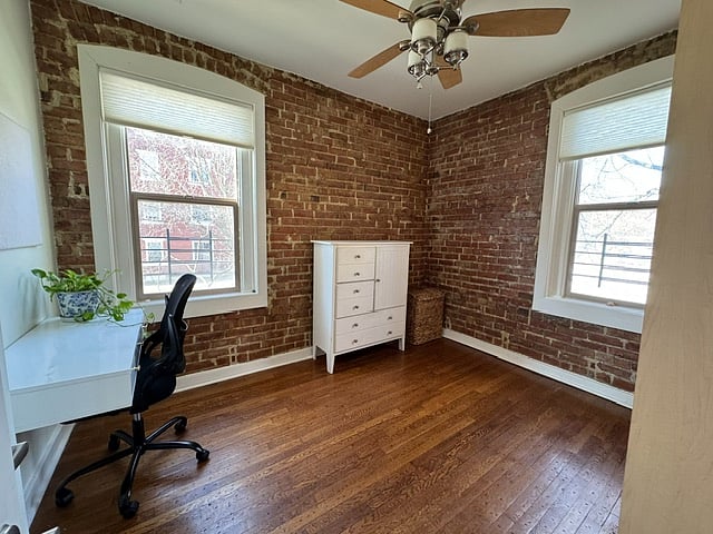 Bedroom with Murphy bed stowed creates a LOT of room to work from home, and creates a great zoom backdrop.