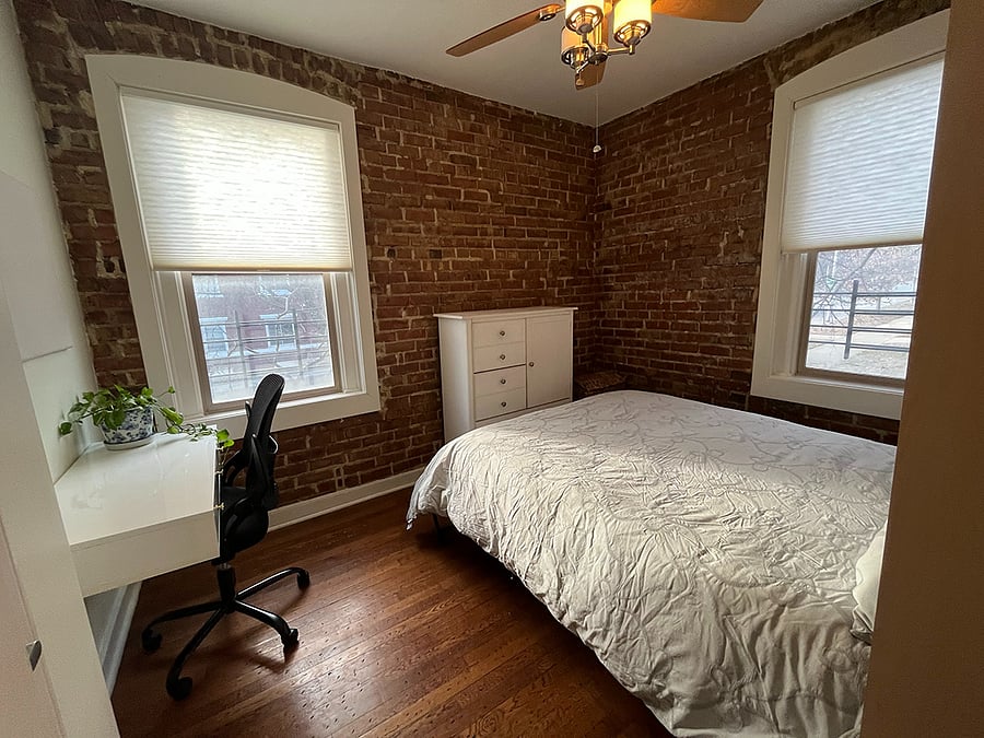 Bedroom with Queen size Murphy bed down. Closet optimized for storage. Full-size dresser. Work-from-home floating desk.