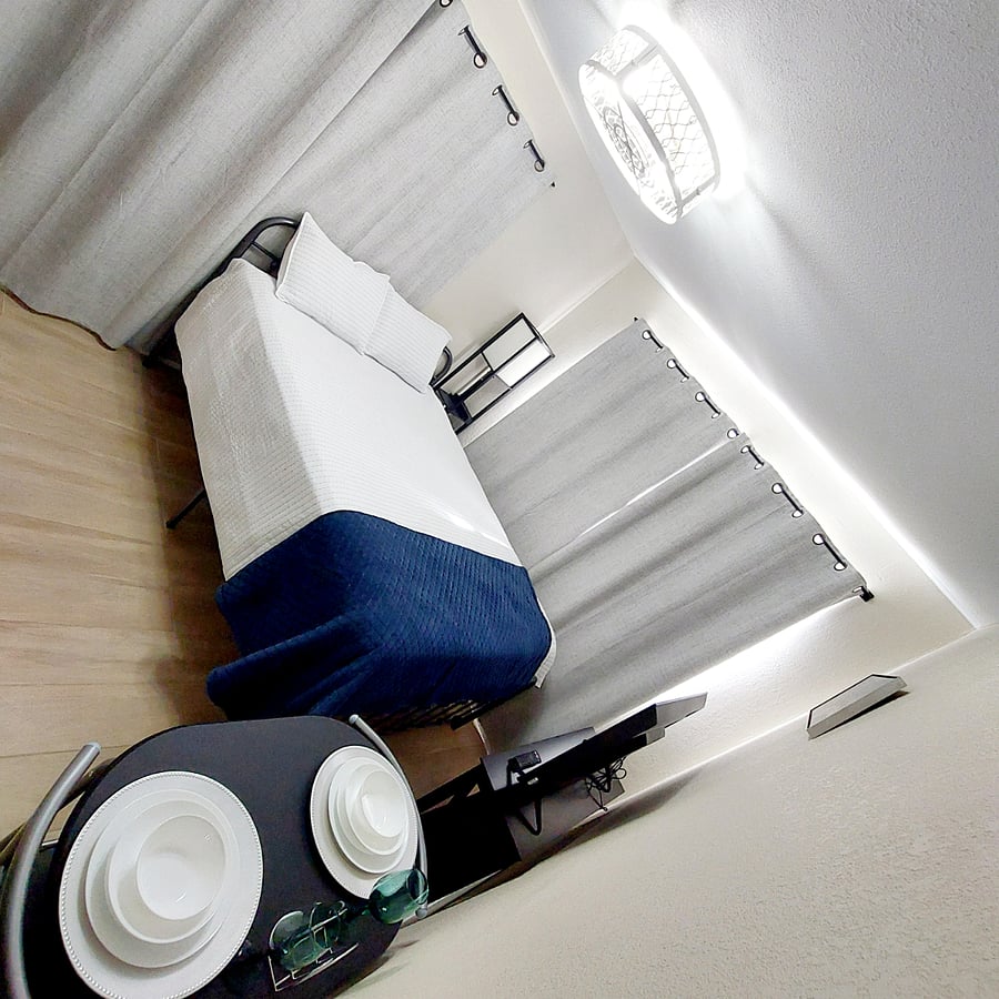 Queen bed comes with 2 pillow shams, comforter, blue blanket and mattress and pillow cover protector.  2 sets of bedsheets will be provided.