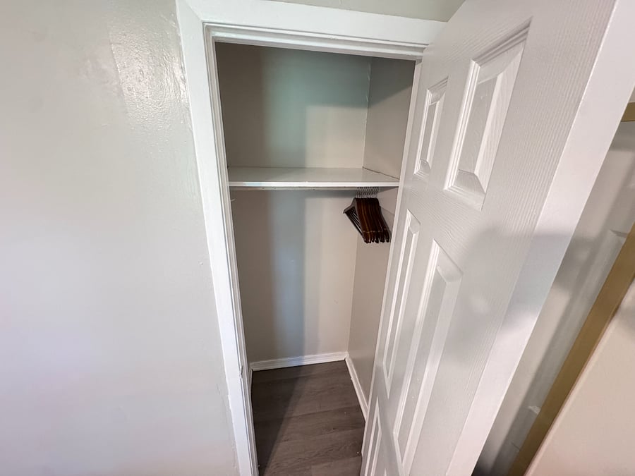 Every room features a walk-in closet with hangers.