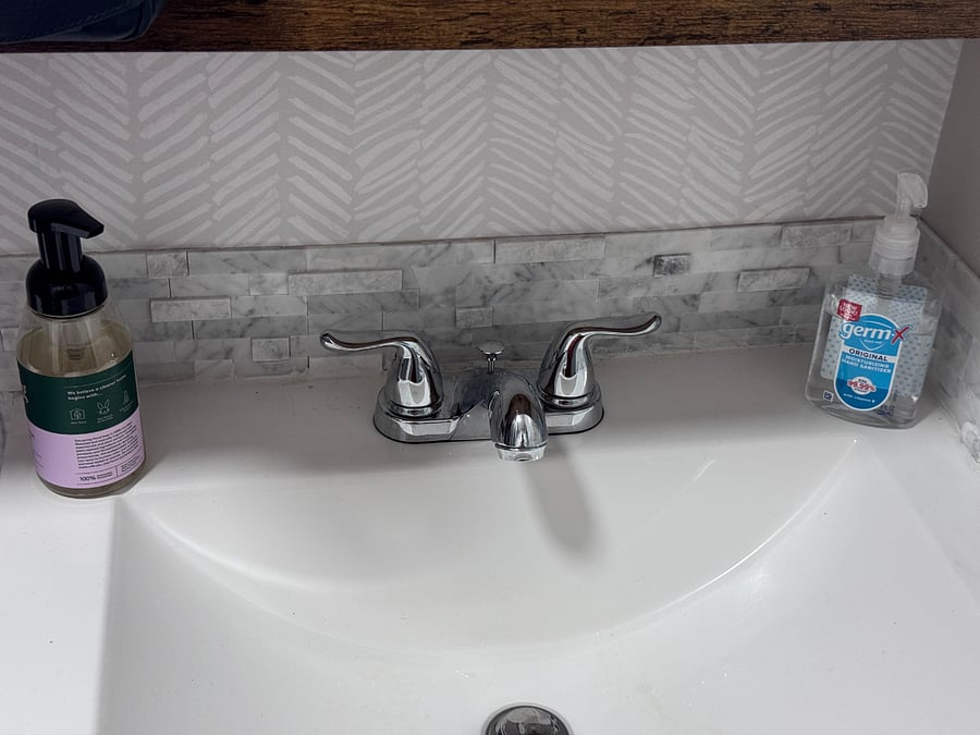 Soap and sanitizer fully stocked.