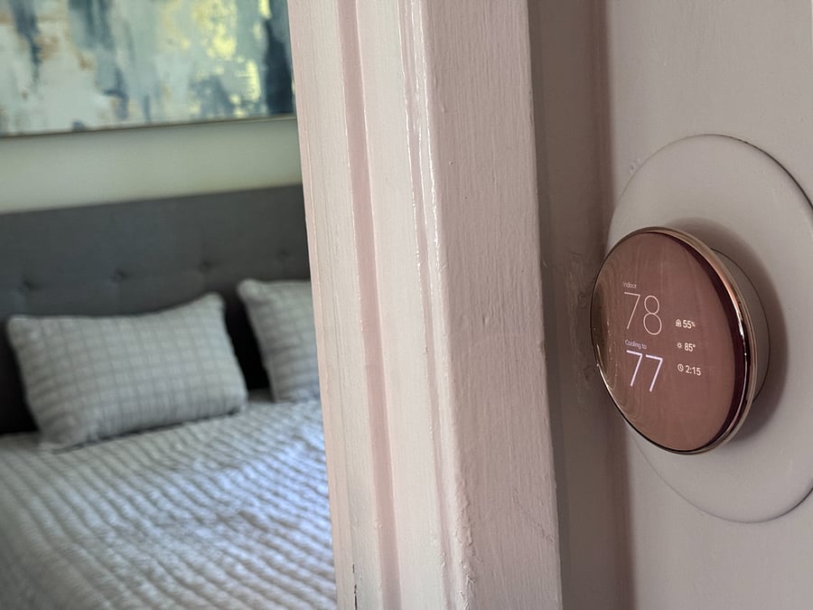 Control the smart thermostat from your phone or the hallway.