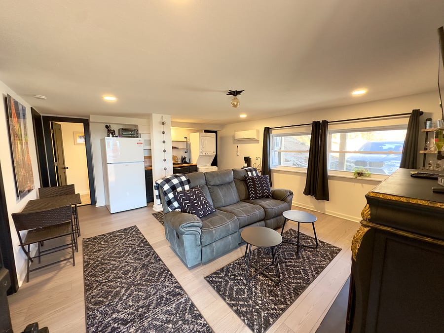 spacious living area with reclining couch