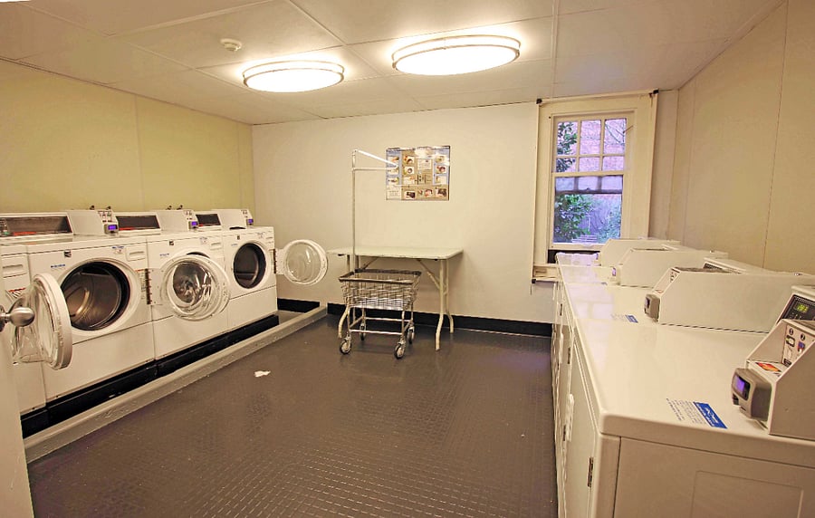 Laundry room inside the building on the main level.
