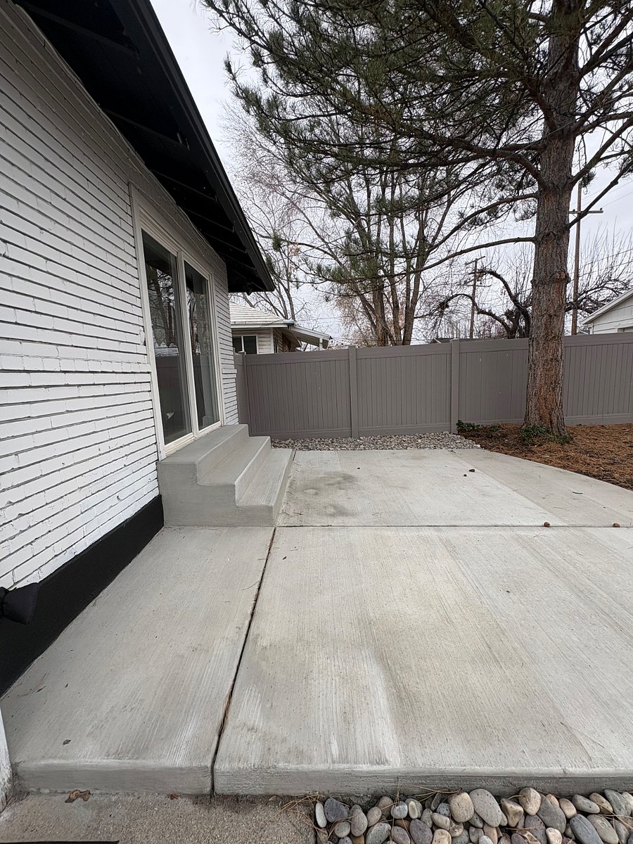 Back patio with fully fenced yard