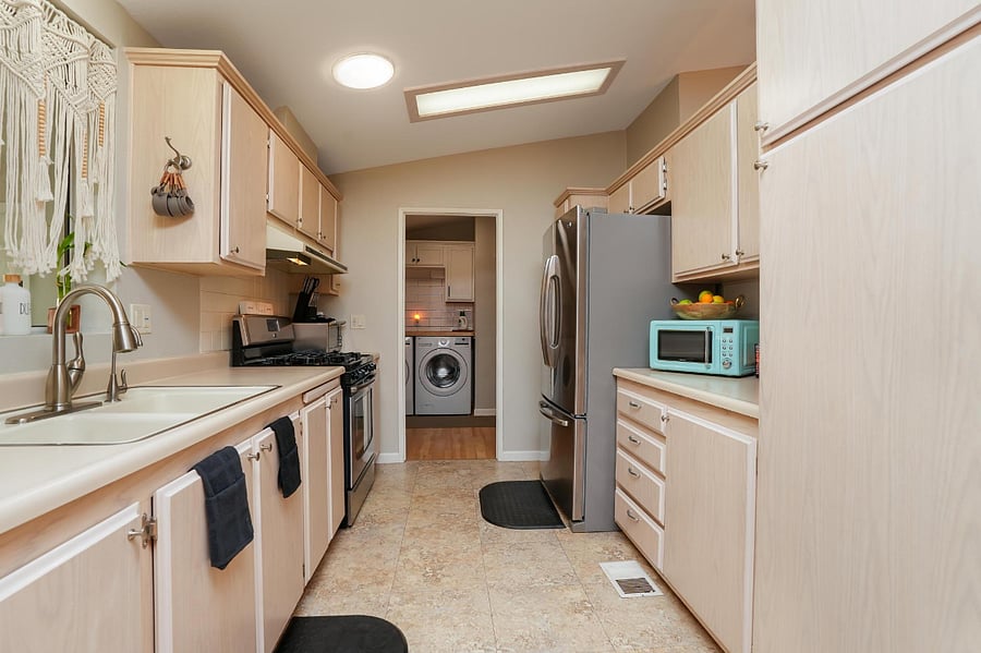 Kitchen has RO system, toaster oven, stove/oven and microwave. 