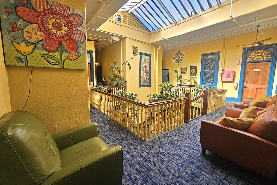 Our colorful decor and glass atrium ceiling keep our hostel vibrant and brings a bit of the outdoor inside.