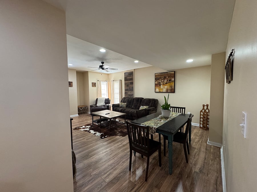 Living room and dining area (view 4)
